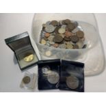 A CONTAINER OF COMMEMORATIVE CROWNS AND FOREIGN COINS
