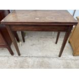 A 19TH CENTURY MAHOGANY AND INLAID FOLD-OVER TABLE 35.5" WIDE