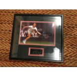 A FRAMED SIGNED PICTURE OF BORIS BECKER