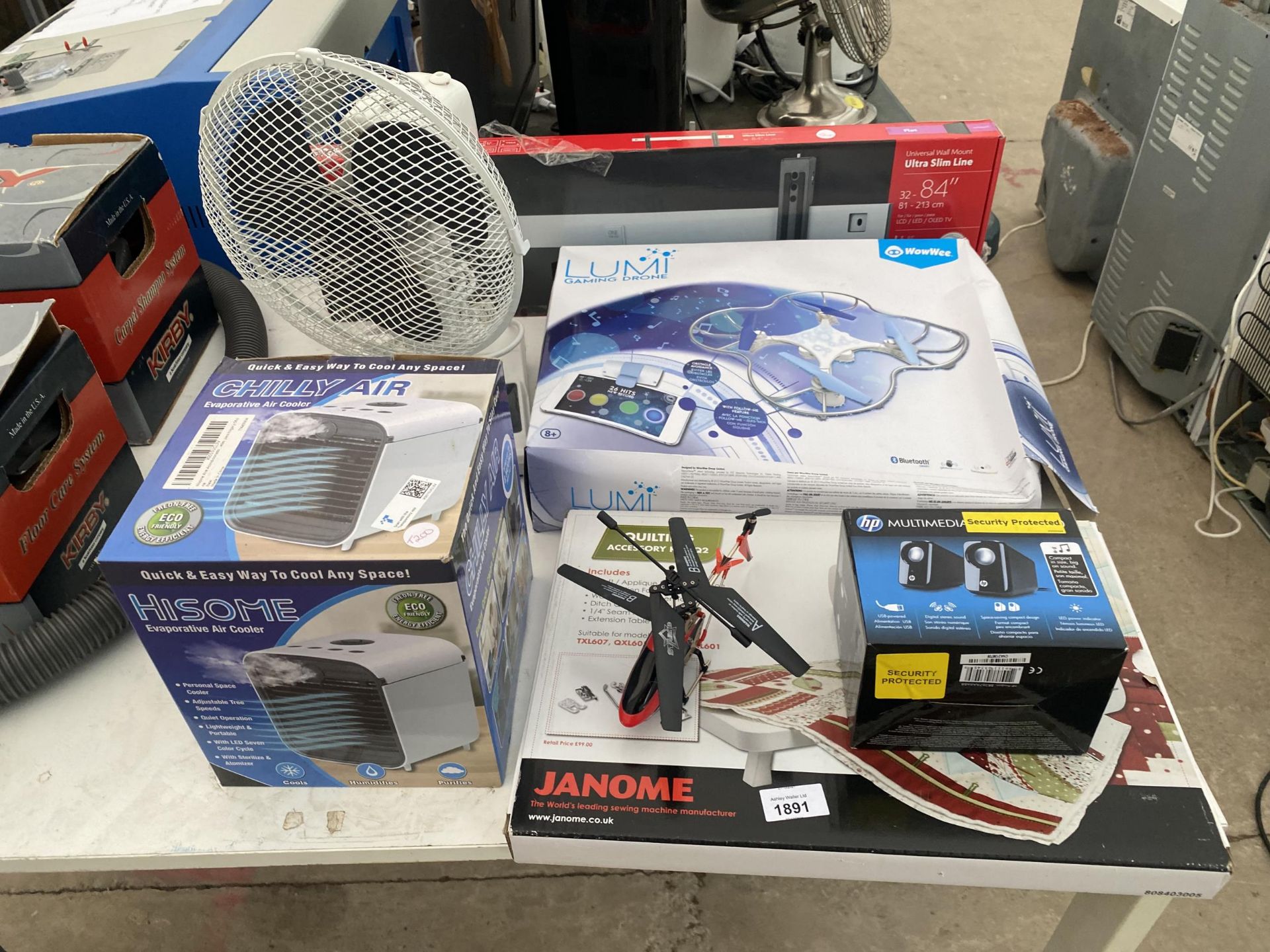 AN ASSORTMENT OF ITEMS TO INCLUDE A TV BRACKET, AN AIR COOLER AND MULTIMEDIA SPEAKERS ETC