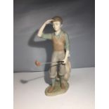 A LARGE NADAL PORCELAIN GOLFER