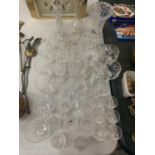 A QUANTITY OF GLASSWARE TO INCLUDE WINE, SHERRY, VASES, ROSSE BOWL AND LIQUER ETC