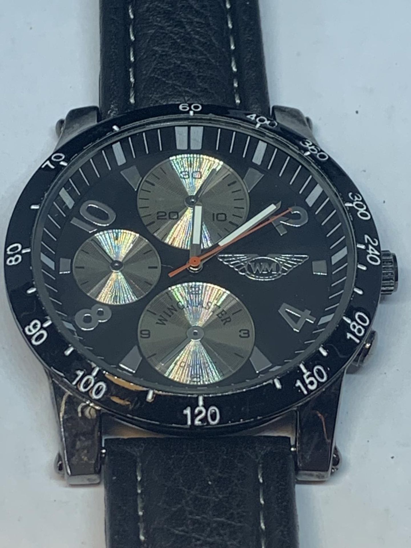 A CHRONOGRAPH WRIST WATCH WITH A BLACK LEATHER STRAP SEEN WORKING BUT NO WARRANTY - Image 2 of 3