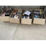 A LARGE ASSORTMENT OF DVDS AND CDS ETC