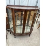 A SHINY WALNUNT BOW-FRONTED DISPLAY CABINET ON CABRIOLE LEGS 41" WIDE