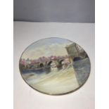 A CABINET PLATE HANDPAINTED AND SIGNED WITH THE DEE BRIDGE CHESTER