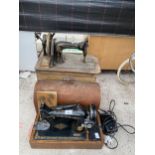 A VINTAGE SINGER SEWING MACHINE AND A FURTHER FRISTER & ROSSMAN SEWING MACHINE