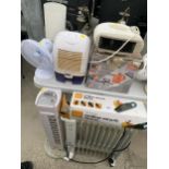 AN ASSORTMENT OF ITEMS TO INCLUDE A STEASM GUN, A DEHUMIDIFER AND VARIOUS HEATERS ETC
