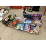 AN ASSORTMENT OF BOARD GAMES TO INCLUDE MONOPOLY, TRIVIAL PURSUIT AND BACKGAMMON ETC