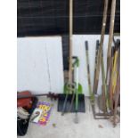 TWO SNOW SHOVELS, A RAKE AND A HACK SAW