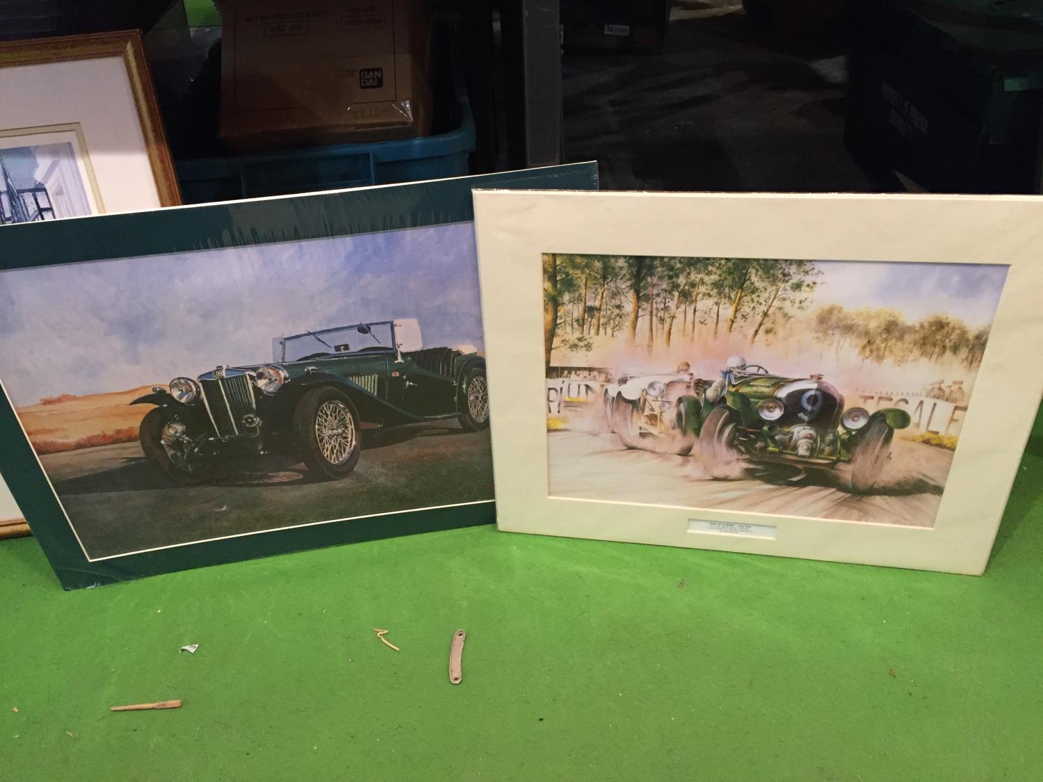 TWO PRINTS IN MOUNTS ONE OF A VINTAGE MG AND ONE OF DUAL AT LE MANS