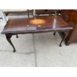 A MODERN INLAID MAHOGANY COFFEE TABLE ON CABRIOLE SUPPORTS - 38" X 19"