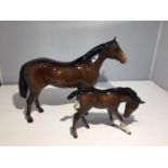 TWO BESWICK HORSES, ONE LARGER HORSE AND A SMALLER FOAL