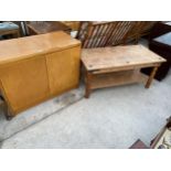 A MODERN TWO DOOR CABINET AND A MEXICAN PINE COFFEE TABLE