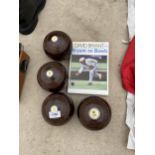 FOUR VINTAGE TAYLOR ROLPH CROWN GREEN BOWLS AND A DAVID BRYANT BOOK ON BOWLS