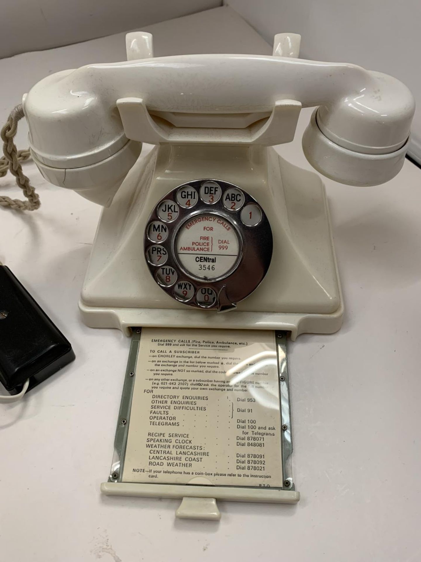 A VINTAGE IVORY BAKELITE TELEPHONE WITH NUMBER STORAGE DRAWER WIRED FOR MODERN USE BUT NO WARRANTY - Image 2 of 4