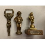 THREE PIECES OF RISQUE BRASSWARE TO INCLUDE A BOTTLE OPENER