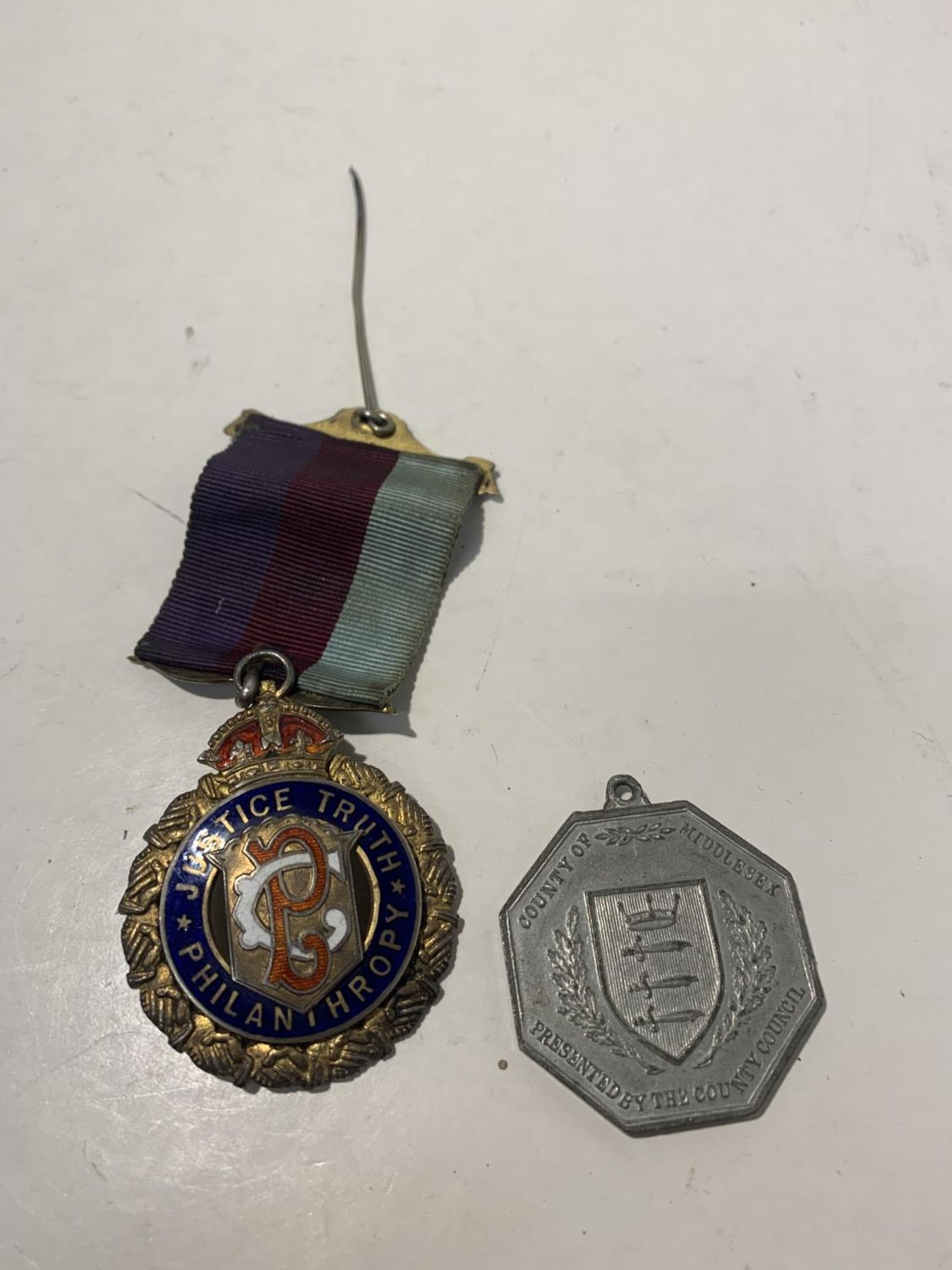 A HALLMARKED LONDON SILVER MASONIC MEDAL AND A 1935 JUBILEE MEDALLION