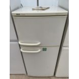 A WHITE BOSCH CLASSIX UPRIGHT FRIDGE FREEZER WITH INSTRUCTION MANUAL