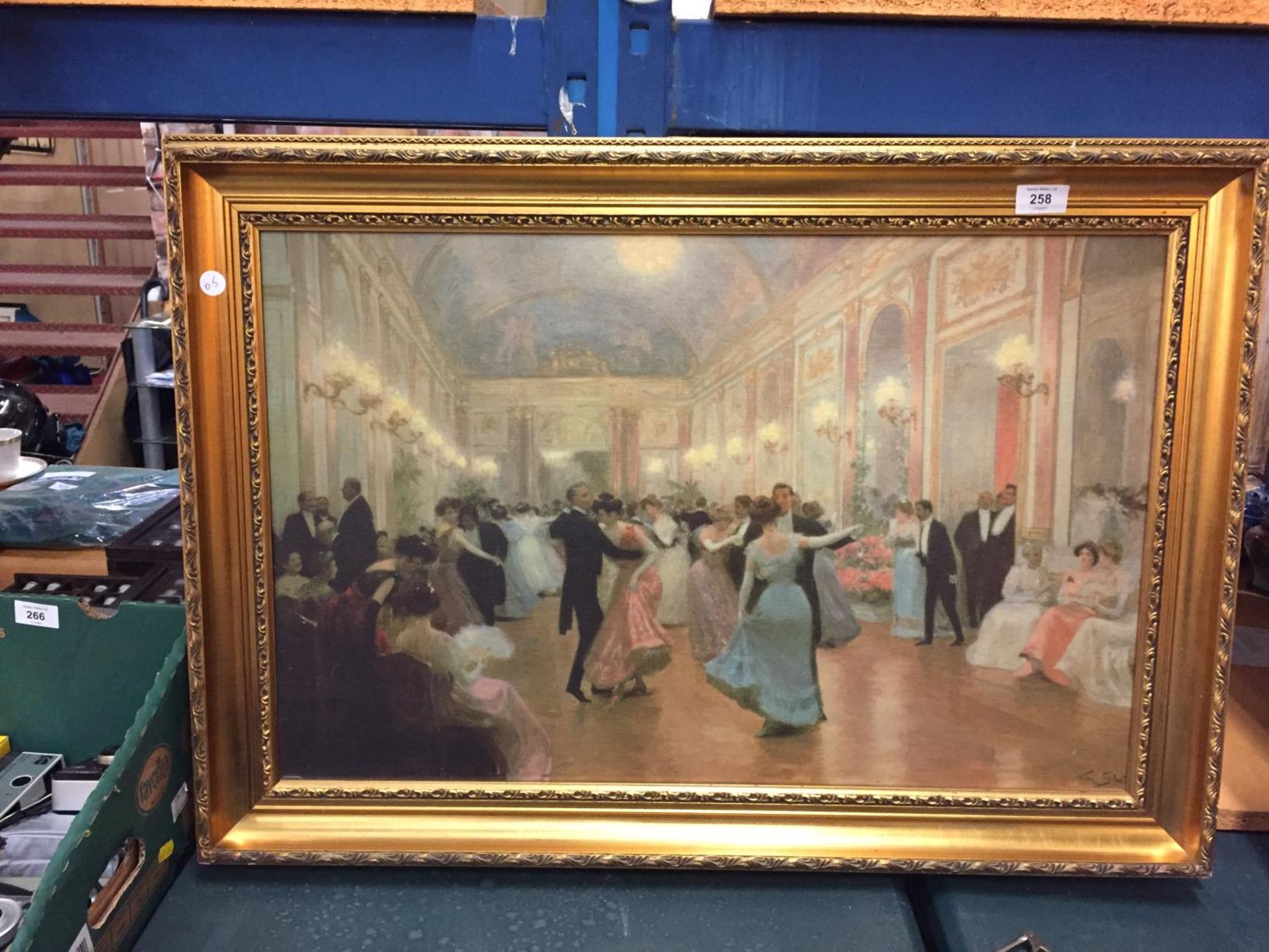 A LARGE GILT FRAMED PICTURE OF A BALL