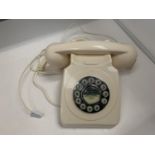 A MODERN BAKELITE STYLE TELEPHONE WITH PUSH BUTTONS WIRED FOR MODERN USE BUT NO WARRANTY