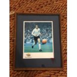A FRAMED SIGNED PICTURE OF MARTIN CHIVERS PLAYING FOR ENGLAND WITH CERTIFICATE OF AUTHENTICITY