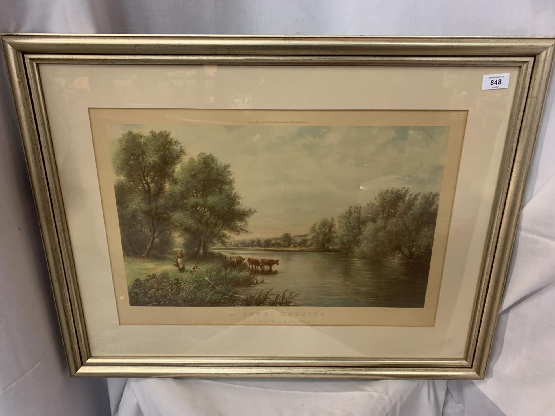 TWO LARGE FRAMED PRINTS OF VINTAGE SCENES INCLUDING CATTLE IN A RIVER SETTING