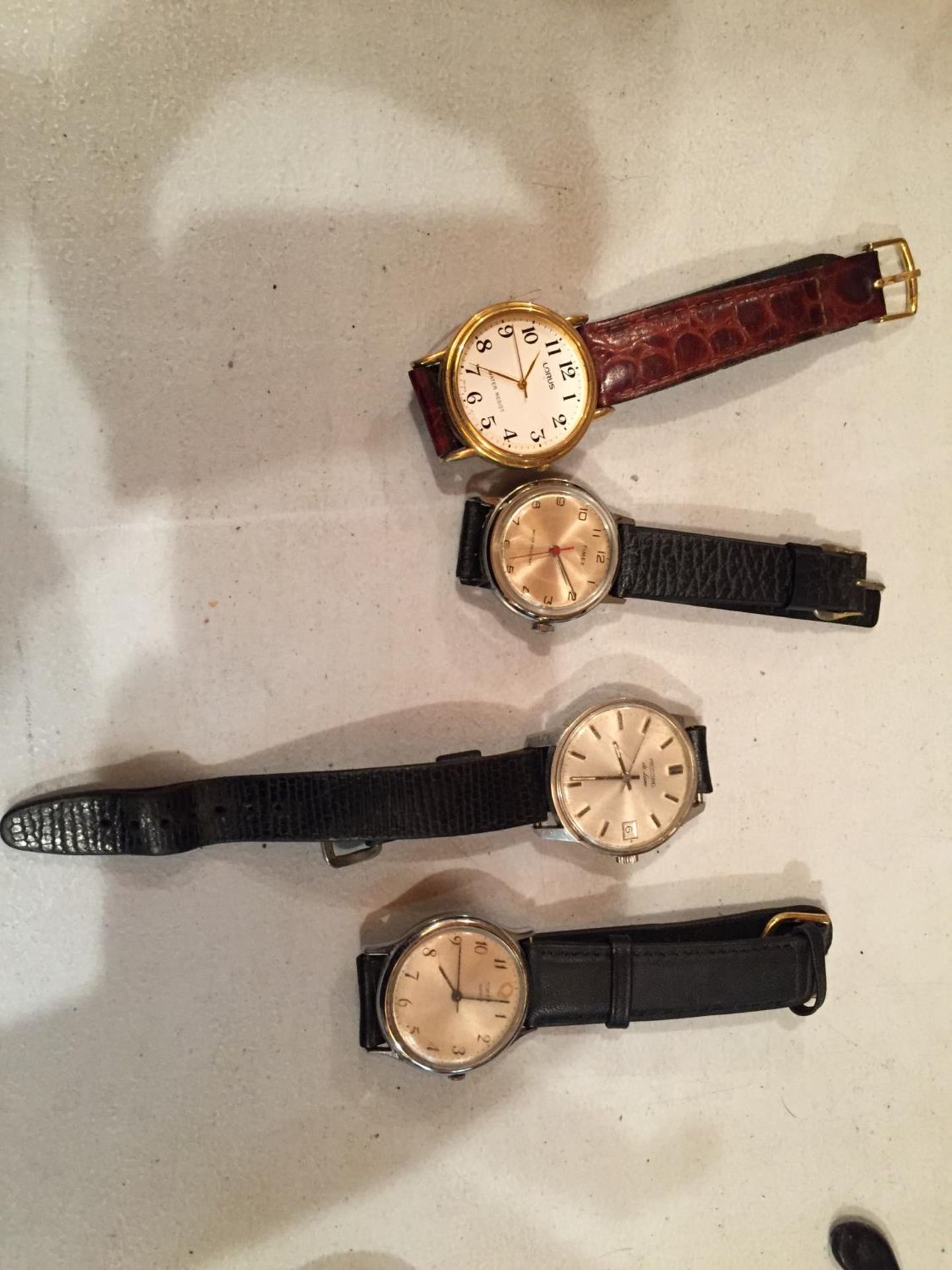 FOUR WATCHES TO INCLUDE TIMEX AND LORUS