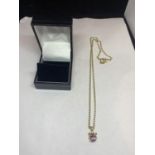 A 14 CARAT GOLD NECKLACE WITH AMETHYST PENDANT IN A PRESENTATION BOX