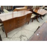 A REPRODUCTION MAHOGANY DINING ROOM SUITE TO INCLUDE A SIDEBOARD, EXTENDING DINING TABLE AND FOUR