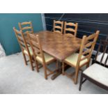 A REFECTORY STYLE DINING TABLE WITH WOODBLOCK TYPE TOP AND SIX LADDER BACK DINING CHAIRS