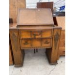 AN EARLY 20TH CENTURY OAK BUREAU 33" WIDE