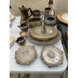 AN ASSORTMENT OF EPNS ITEMS TO INCLUDE JUGS, A COFFEE POT AND TWO TRIVET STANDS ETC