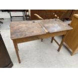 A CHILD'S VINTAGE BEECH DOUBLE SCHOOL DESK