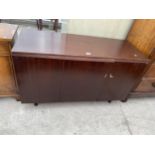 A MAHOGANY OFFICE DESK/ FILING SYSTEM BEARING A WESTMINSTER OFFICE FURNITURE BY NEWCRAFT LABEL 47.5"