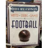 A TIN PLATE SIGN SAYING THERE ARE FOUR SEASONS. WINTER, SPRING, SUMMER, FOOTBALL