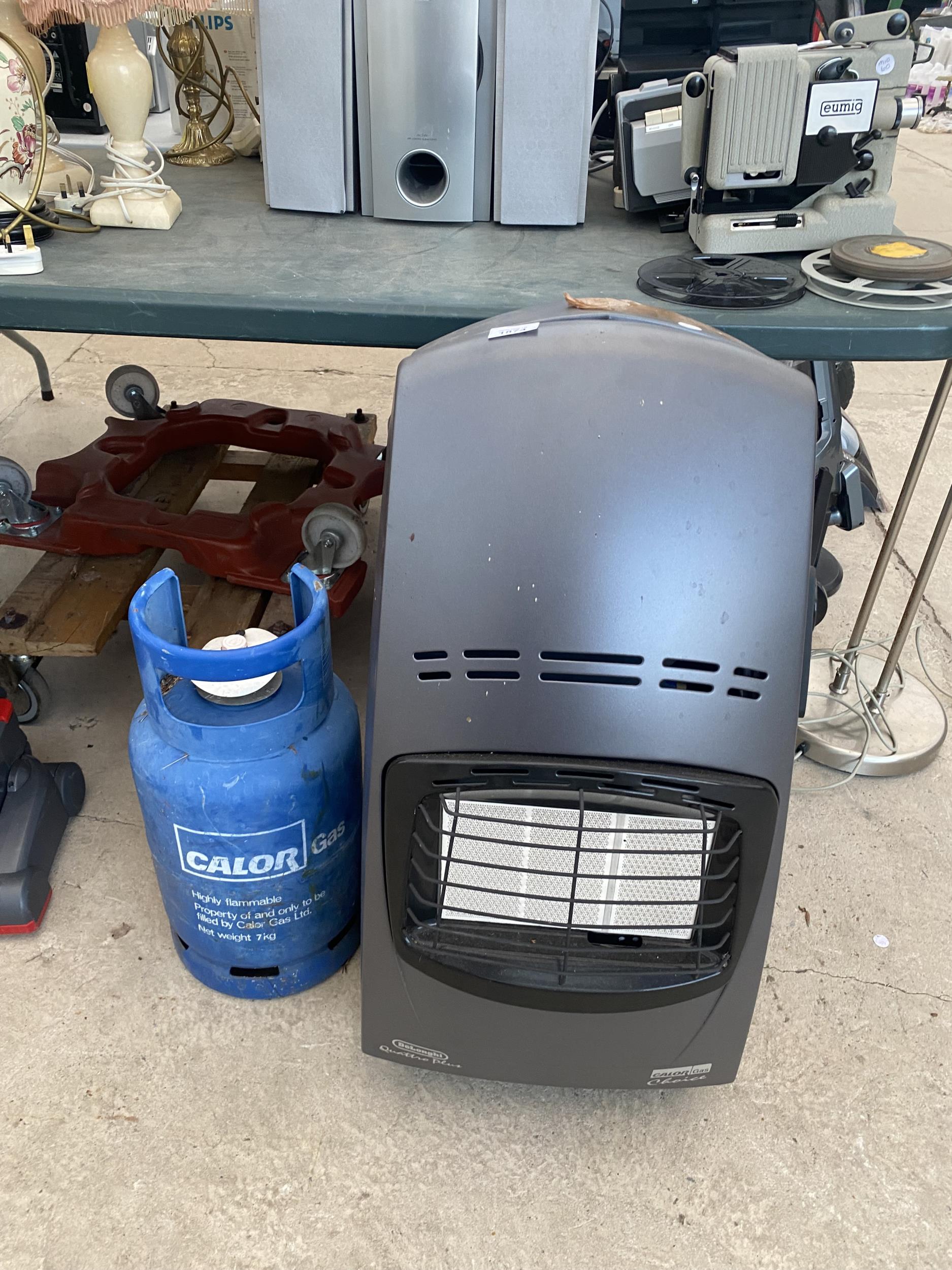 A DELONGHI GAS HEATER WITH A CALOR GAS BOTTLE