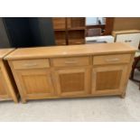 A MODERN LIGHT WOOD SIDEBOARD - 70.5" WIDE