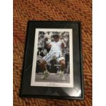 A FRAMED SIGNED PRINT OF RAFAEL NADAL