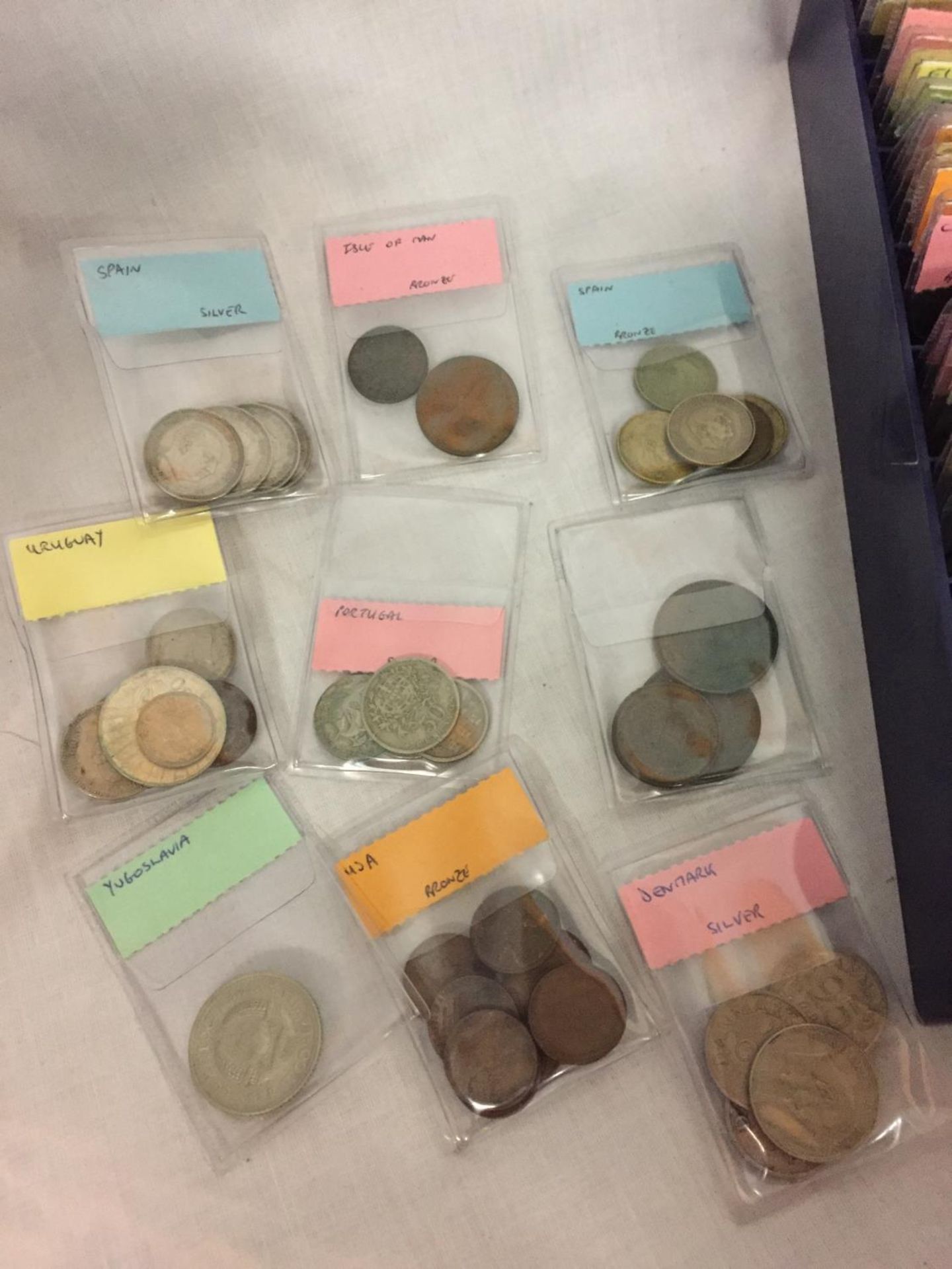 A COINDEX BOX CONTAINING VARIOUS FOREIGN COINS IN MARKED WALLETS - Image 2 of 5