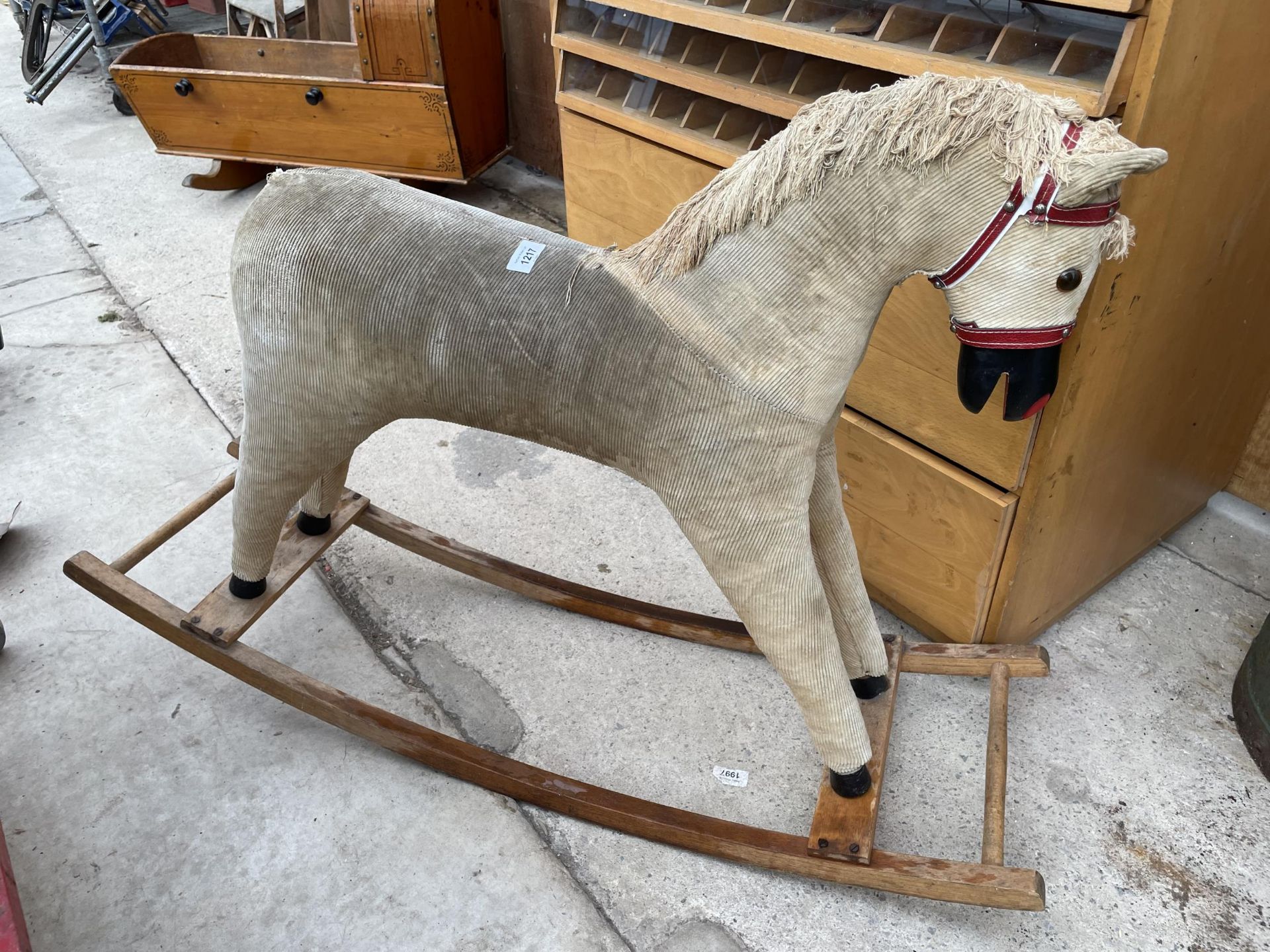 A VINTAGE CHILDRENS ROCKING HORSE