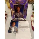 A FRAMED SIGNED PHOTOGRAPH OF KEN DODD, A SIGNED PHOTOGRAPH OF KEN DODD AND A SIGNED LETTER FROM KEN