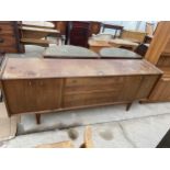 A YOUNGER RETRO TEAK SIDEBOARD WITH FOUR DOORS AND FOUR DRAWERS - 78" WIDE