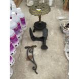 THREE VINTAGE ITEMS TO INCLUDE A BRASS TRIVET STAND WITH CAST BASE, A VINTAGE COBBLERS LAST AND A