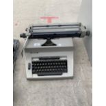 A RETRO ADLER TYPE WRITER