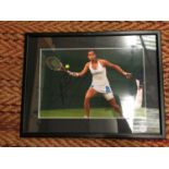 A FRAMED SIGNED PICTURE OF AMELIE MAURESMO WITH CERTIFICATE OF AUTHENTICIY