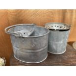 TWO VINTAGE GALVANISED MOP BUCKETS