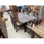 A SET OF EIGHT CHIPPENDALE STYLE MAHOGANY DINING CHAIRS TWO BEING CARVERS AND TWIN PEDESTAL