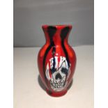 A HANDPAINTED ANITA HARRIS SKULL VASE SIGNED IN GOLD