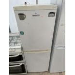 A WHITE BEKO UPRIGHT FRIDGE FREEZER